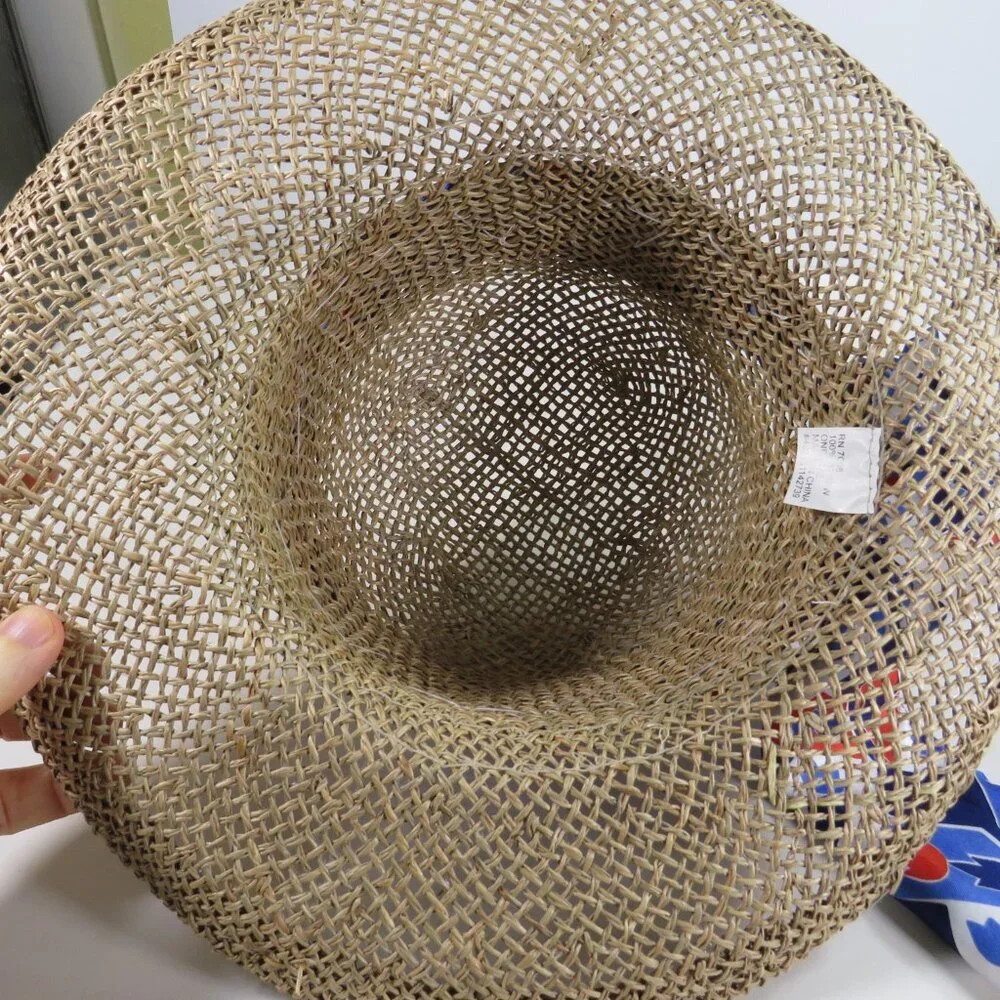 Uena Red White Blue scarf on a dark tan woven hat